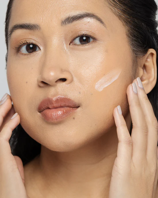 Vivier Acne Treatment Lotion application on a cheek