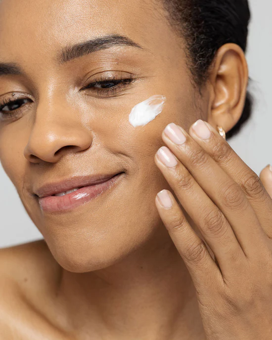 Vivier LEXXEL moisturizer application on a cheek